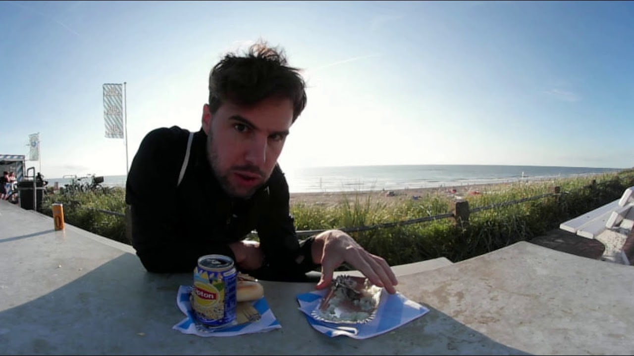 Beach Trash Food eating Herring in holland