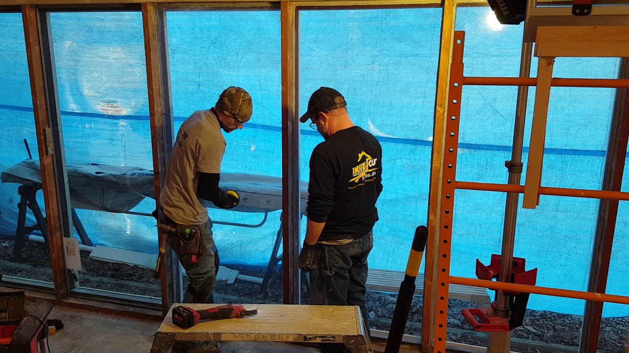 Removing large plate glass windows and replacing with thermal pane