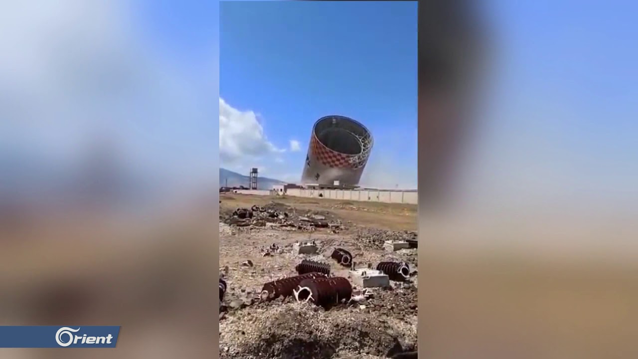 فصيل متشدد يفكك برج محطة زيزون الحرارية غرب حماة لبيعها في سوقِ الخردة