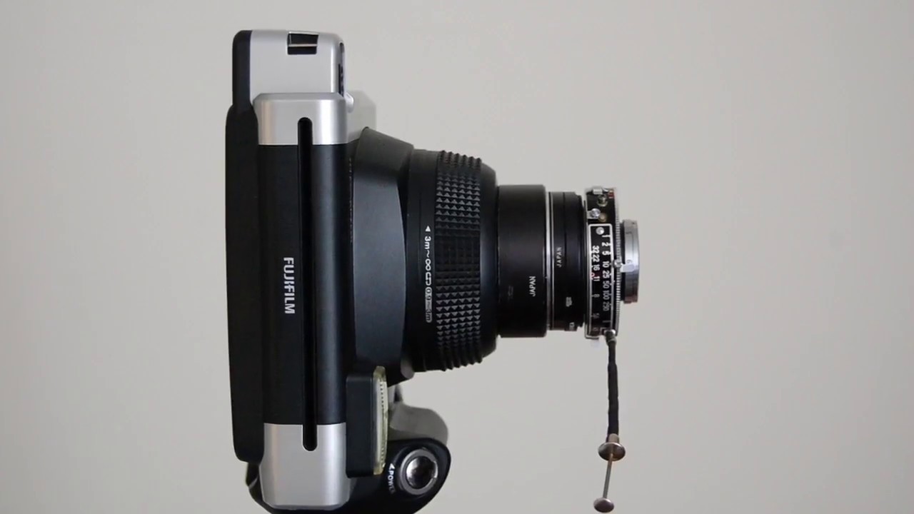 Walkthrough of an Fuji Instax Wide 300 camera modified with a vintage lens