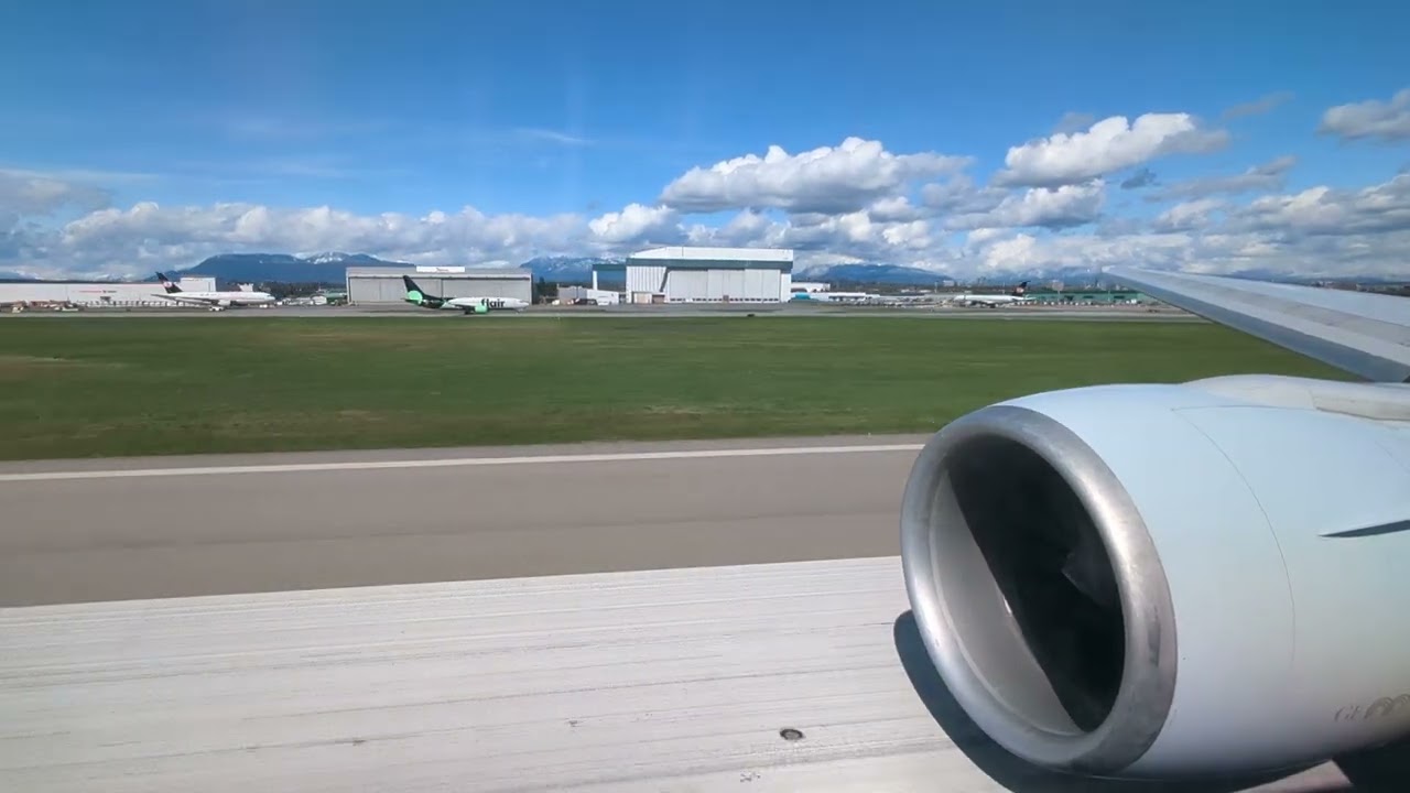 Cathay Pacific Boeing 777-300ER taking off from Vancouver
