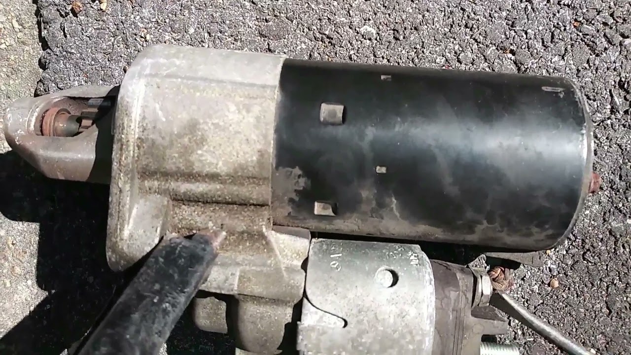How to remove and install a starter on a 2007 Mercedes GL 450