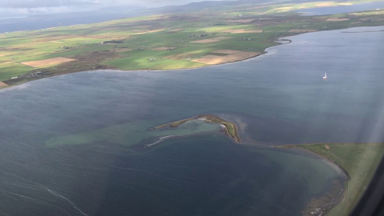Kirkwall Airport - Loganair Saab 2000 approach, landing & taxi
