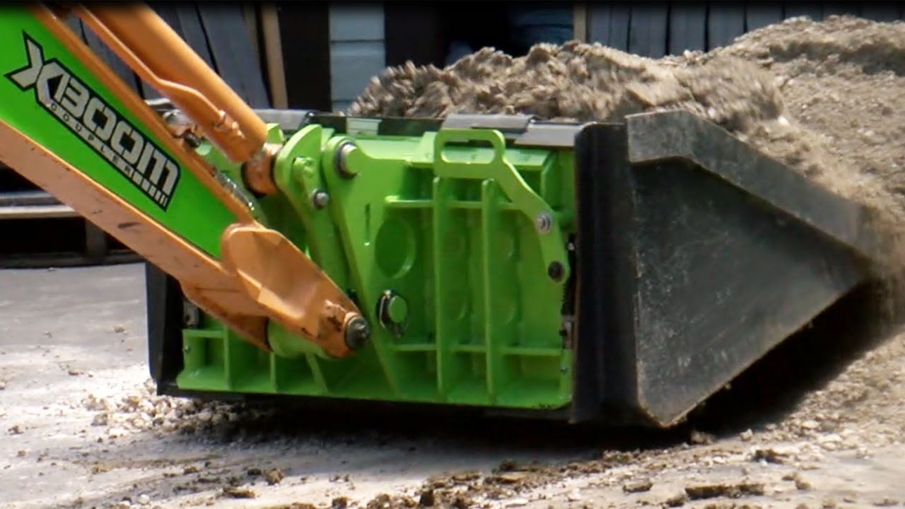 An eXcavator can be a Track Loader? Even Better! with the XBoom Coupler® by AMULET