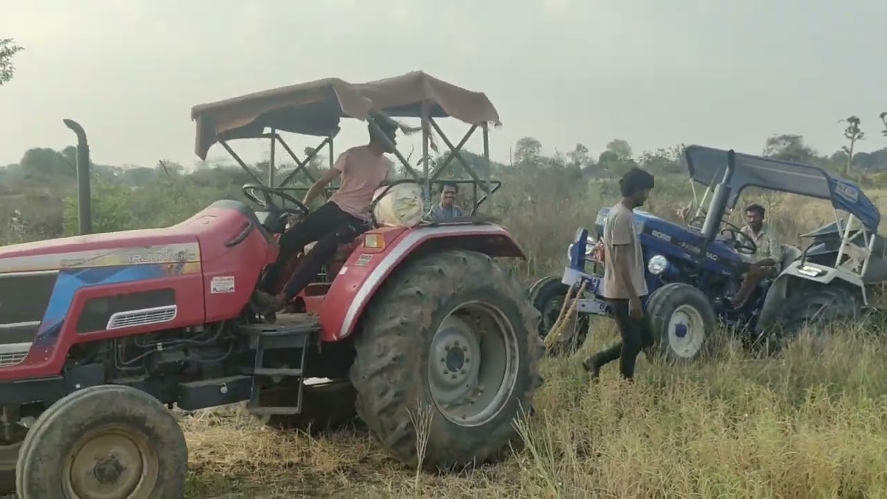 Farmtrac 6055 फस गया है Arjun novo  605 से निकाला था 