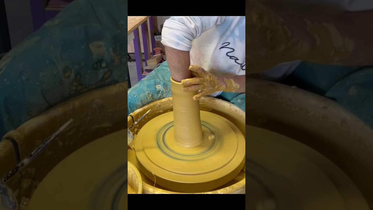 Throwing tall oil bottles #pottery #ceramics #studiopottery #wheelthrowing #potterylife #clayvideo