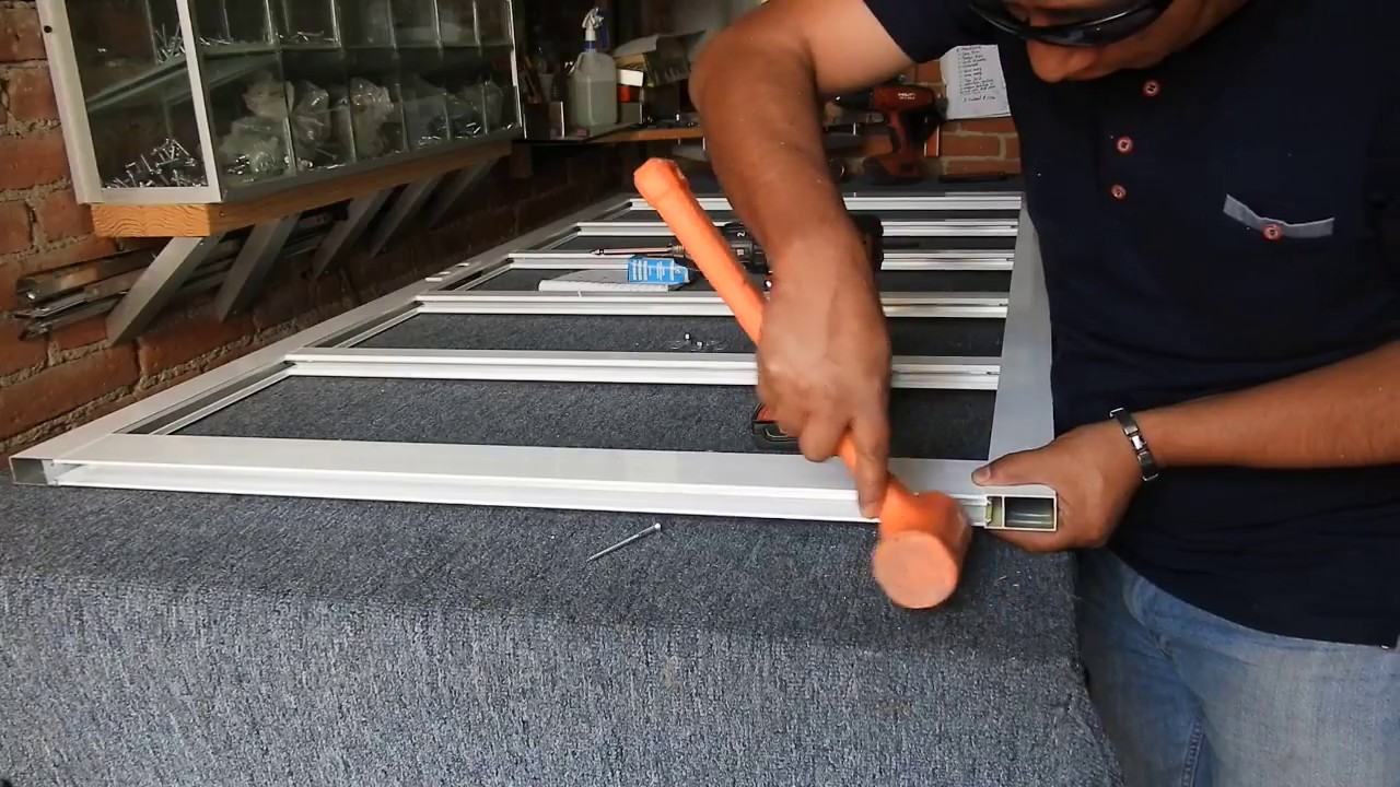 parte 2 como colocar un pivote decentrado y esparrago en puerta ligera