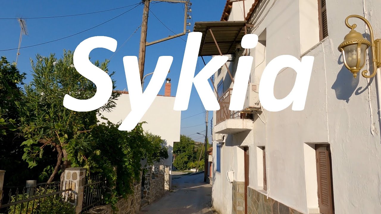 Sykia 1. Hangulatos terek, keskeny sikátorok és történelmi épületek. Festői környezetben.  4K Videó