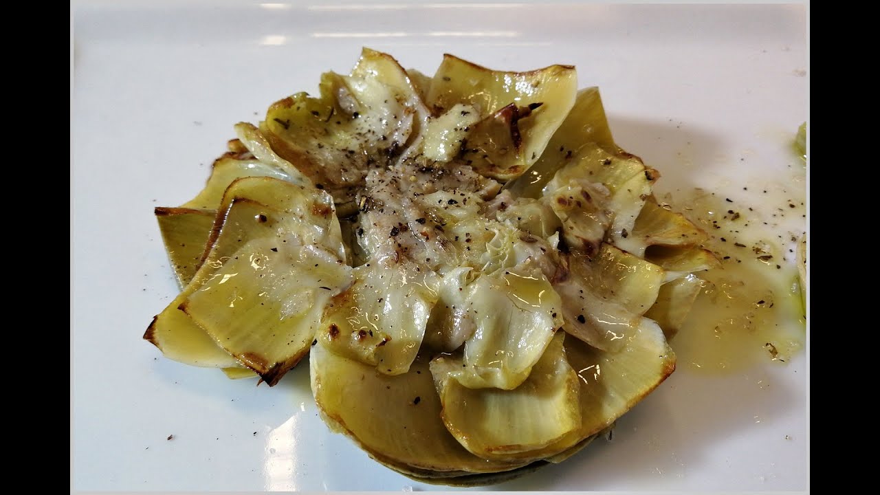 Flor de alcachofa confitada y a la plancha