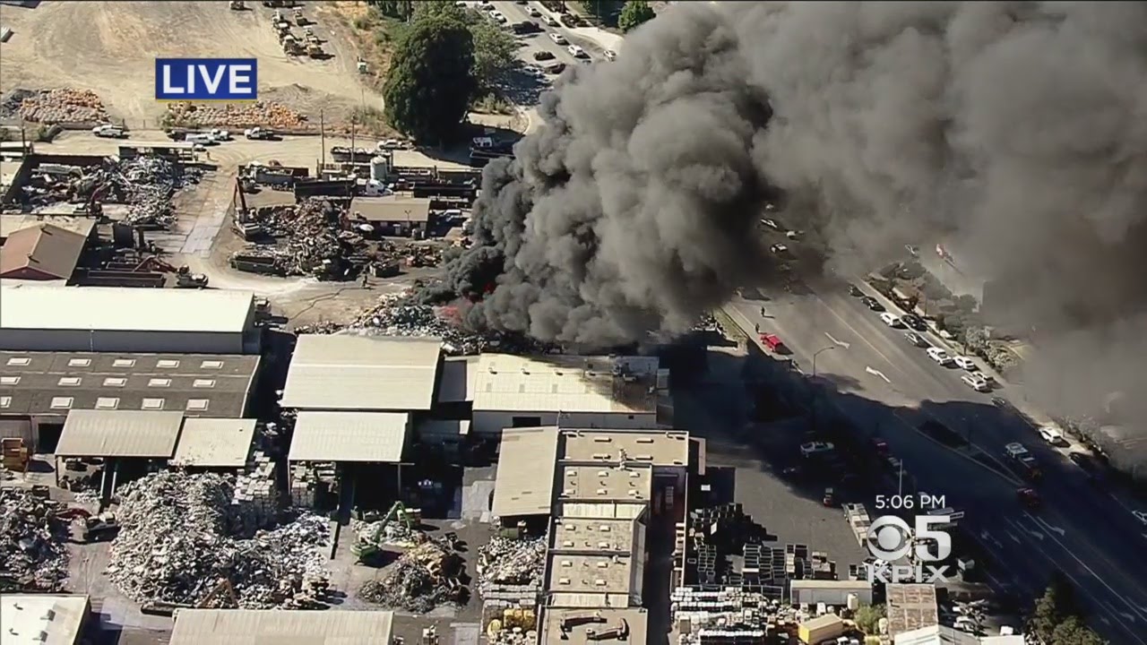 Industrial Fire At East Bay Salvage Yard Produces Huge Cloud Of Smoke
