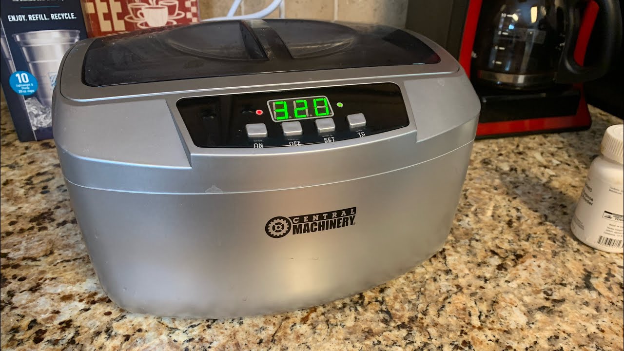 Cleaning Singer Vintage Sewing Machine parts with an ultrasonic cleaner