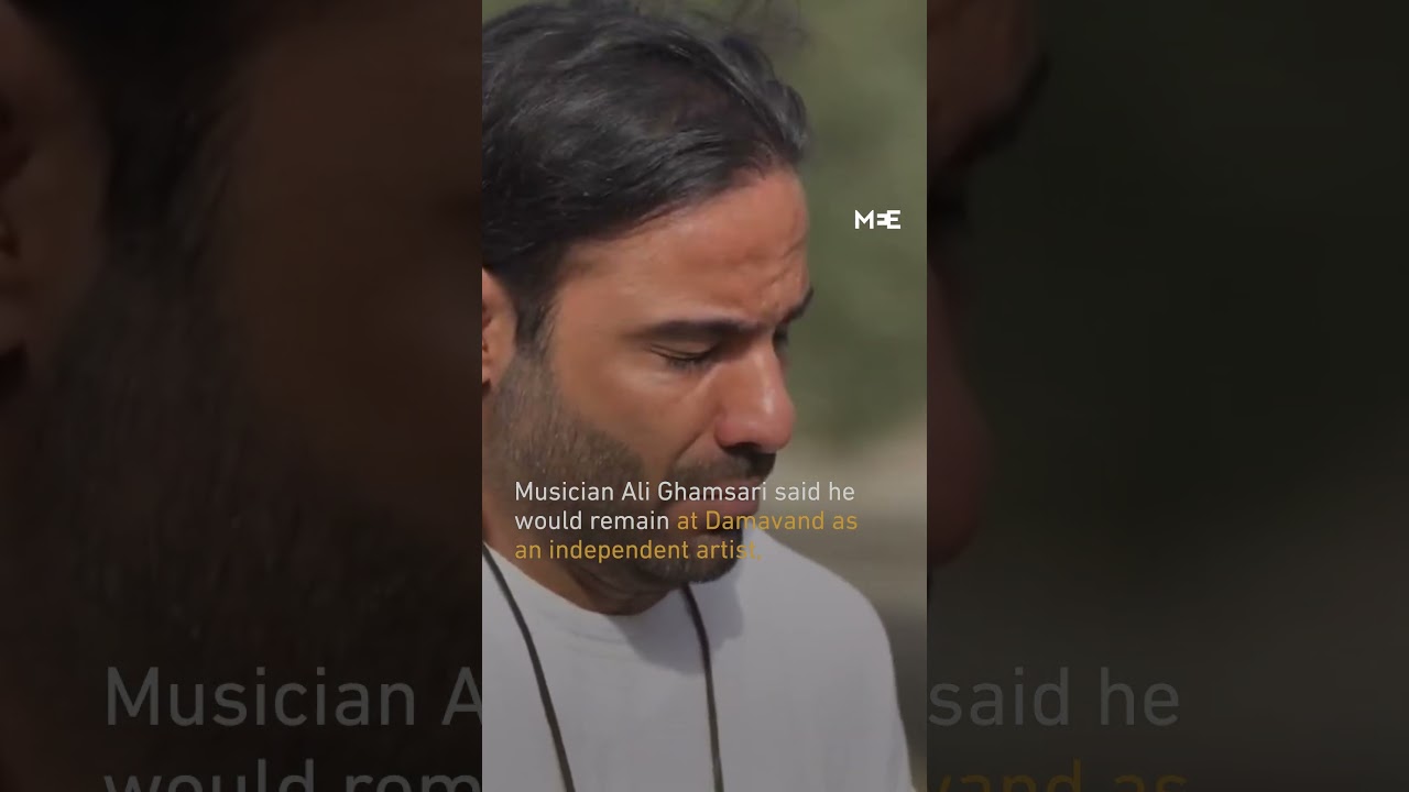 Iranian musician performs outside one of Iran&rsquo;s largest power plants