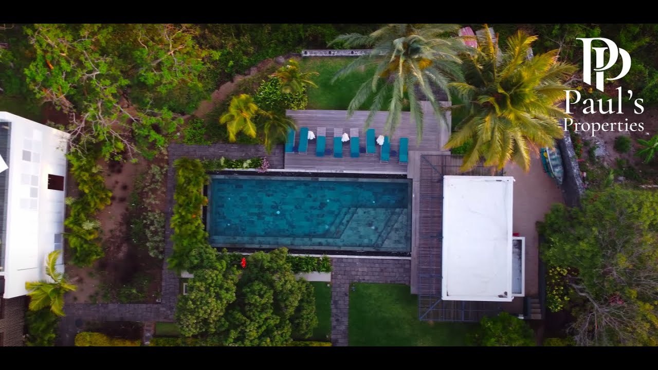 Visiting a Stunning Four-Bedroom Waterfront Penthouse For Sale in Black River, Mauritius With Paul