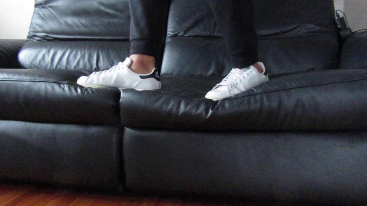 Sockless adidas stan smith / leather couch / sweaty feet