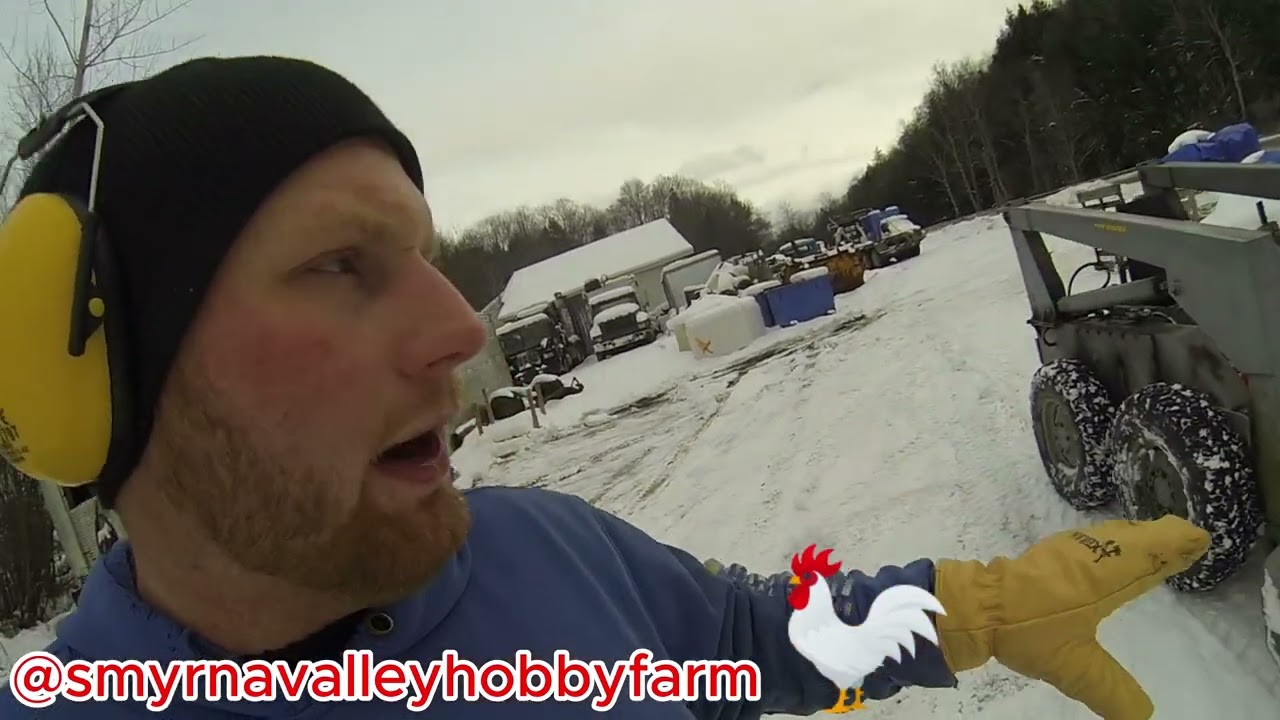 Plowing snow with the skid steer.