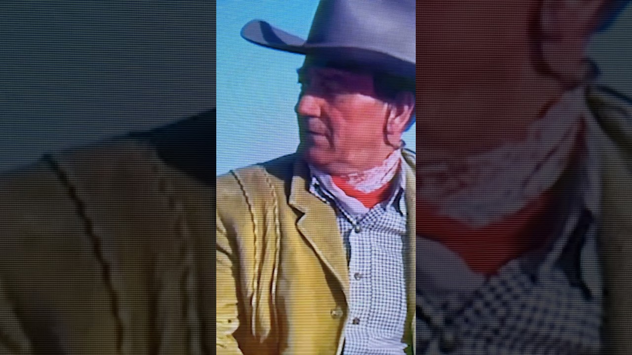 JOHN WAYNE IS CHALLENGED TO A FIGHT.
