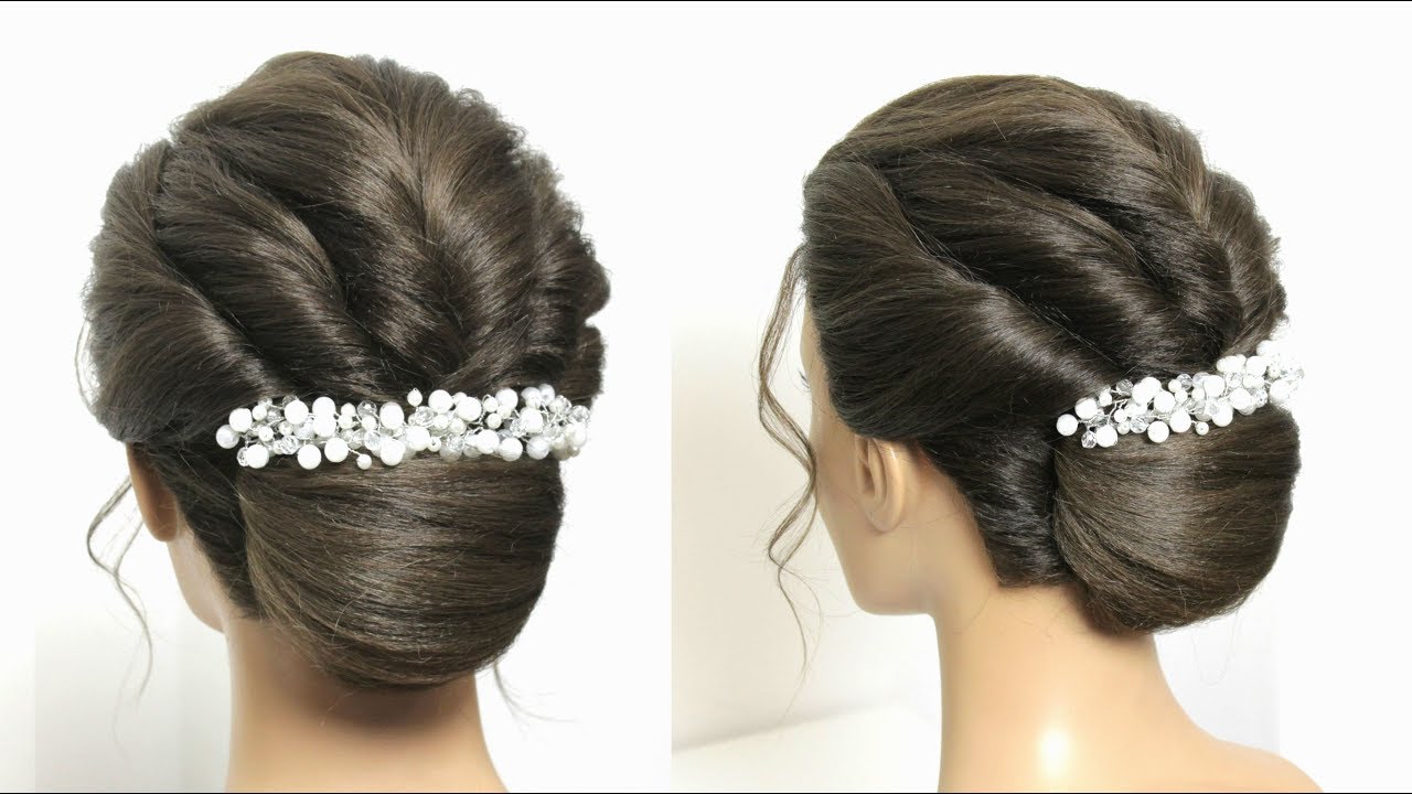 French Roll. Bridal Bun Hairstyle For Long Hair
