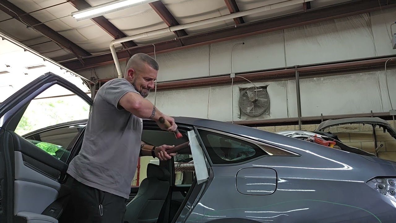 Quarter glass cut out with the WRD Orange Bat attached to the back glass. Honda Accord