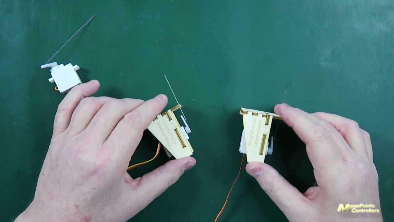 Servo mount for model railways