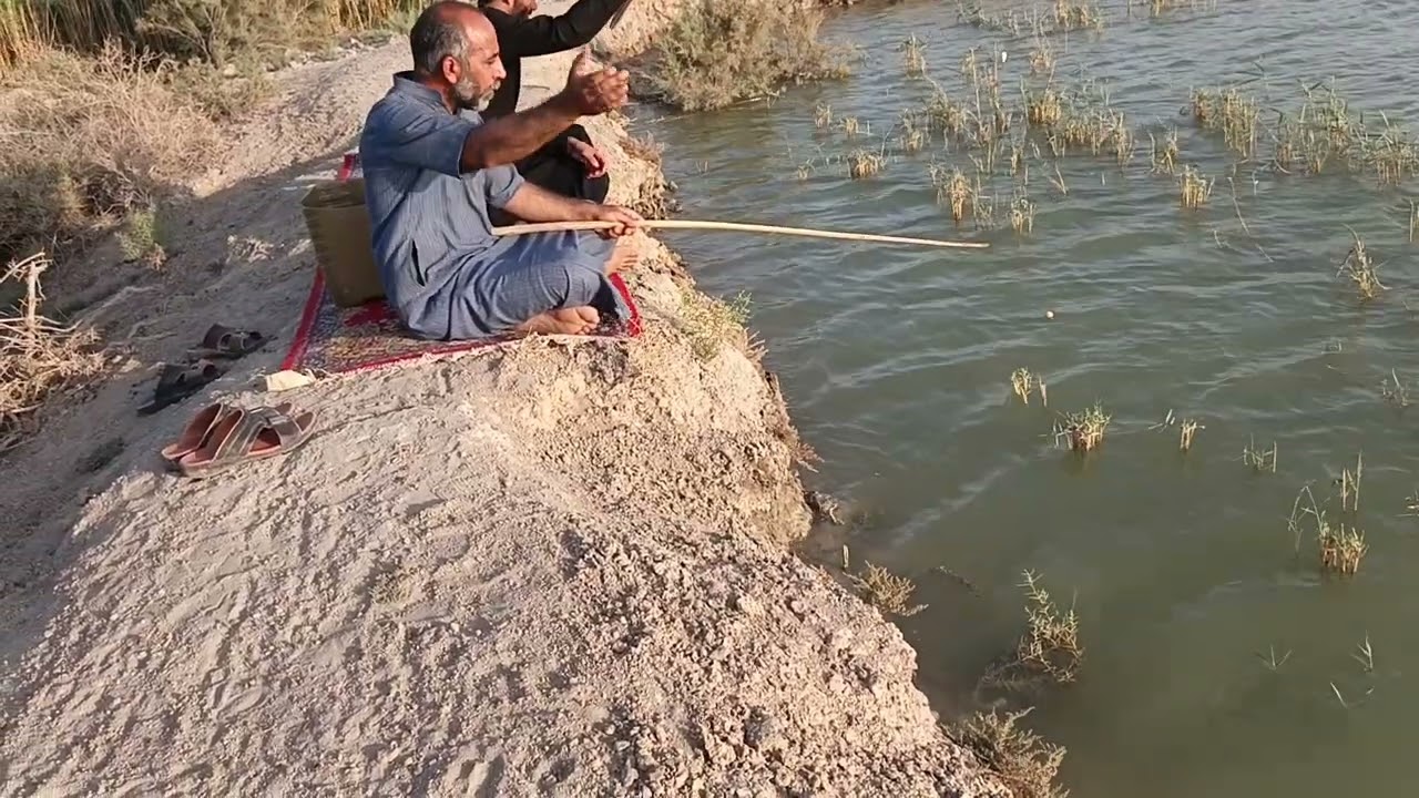ط @صيد السمك على ضفاف شط العرب