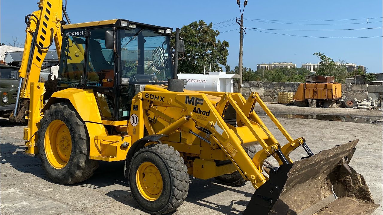 Обзор экскаватор погрузчик Massey Ferguson MF JCB