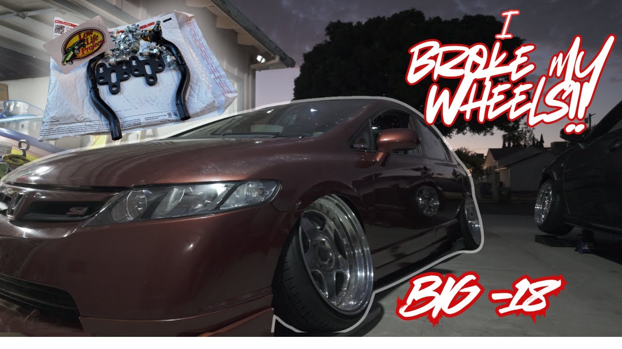 I BROKE MY WHEELS .. BIG -18 CAMBER.  (installing low life project lca extensions.)