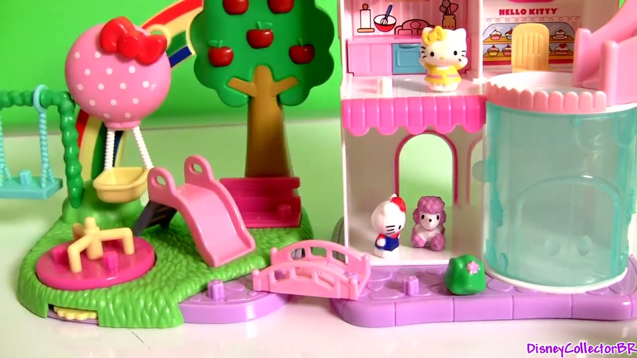 Squinkies Hello Kitty Town Dispenser Playset with Swing Slide Roundabout Playground Bakery Shop