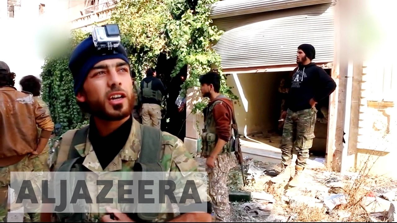 Syria war: Rebel fighters advance in western Aleppo