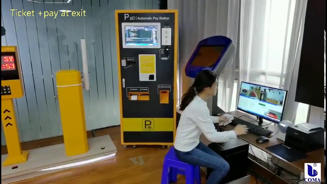 Ticket dispenser parking management system with payment at exit