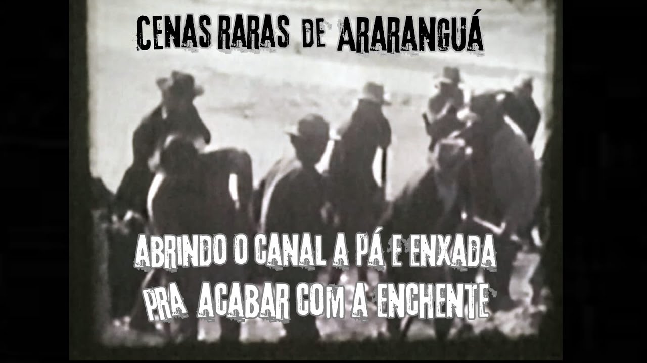 Cenas raras de Ararangu&aacute;, 1977 - homens enfrentam a enchente com p&aacute;s, enxadas e m&aacute;quinas