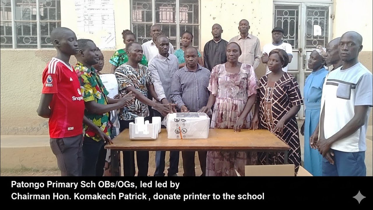 Patongo Primary Sch OBs/OGs, led by Chairman Hon. Komakech Patrick,donate printer to the school.