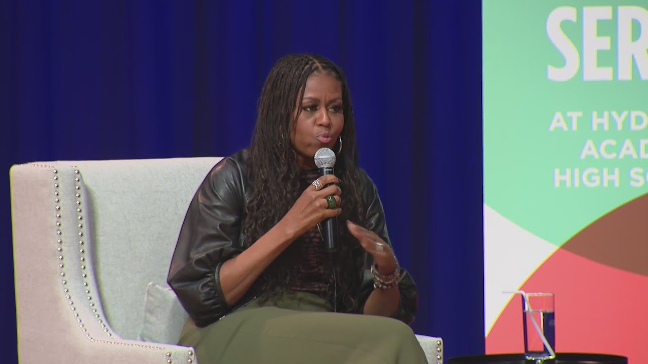 Barack, Michelle Obama vote early, visit schools around Chicago