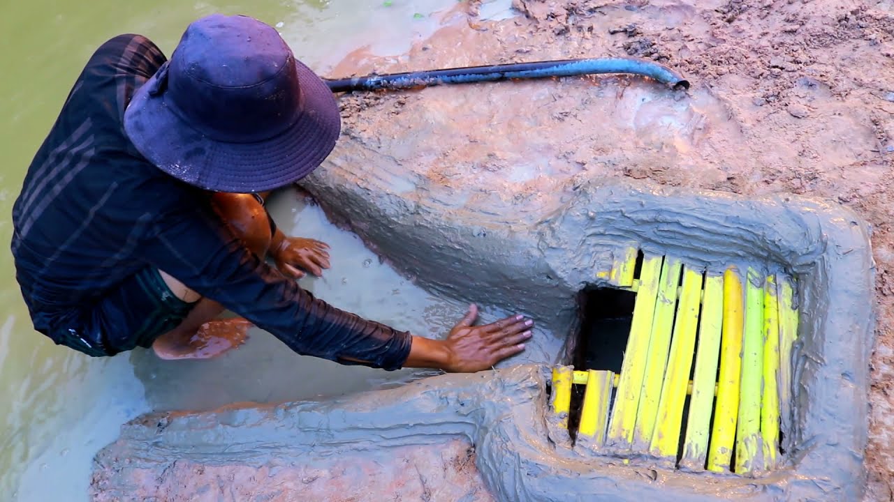 Easy Fish Trap | Smart Boy Build Deep Hole Underground and wood Fish Trap By Muddy soil