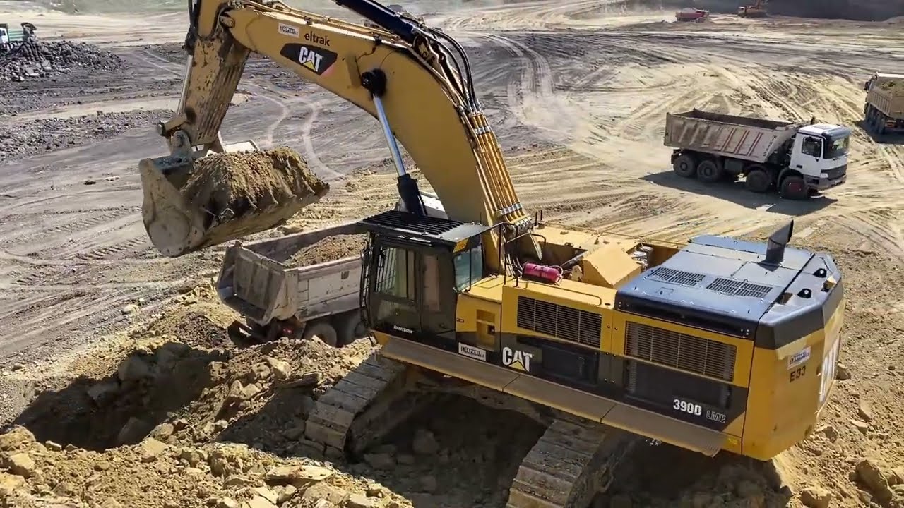Caterpillar 390D Excavator Loading Soil Onto 4 Axle Trucks - Interkat SA