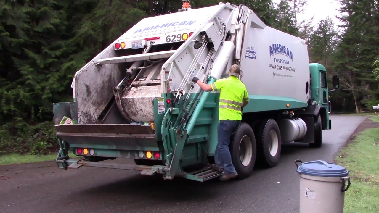 New Way Rear Loader on a Pete 320 Chassis