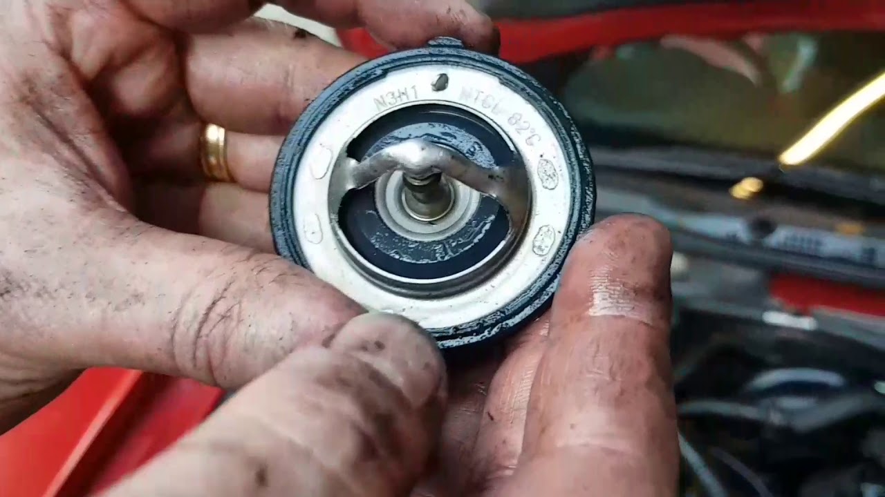 How to replace a Mazda RX8 Thermostat