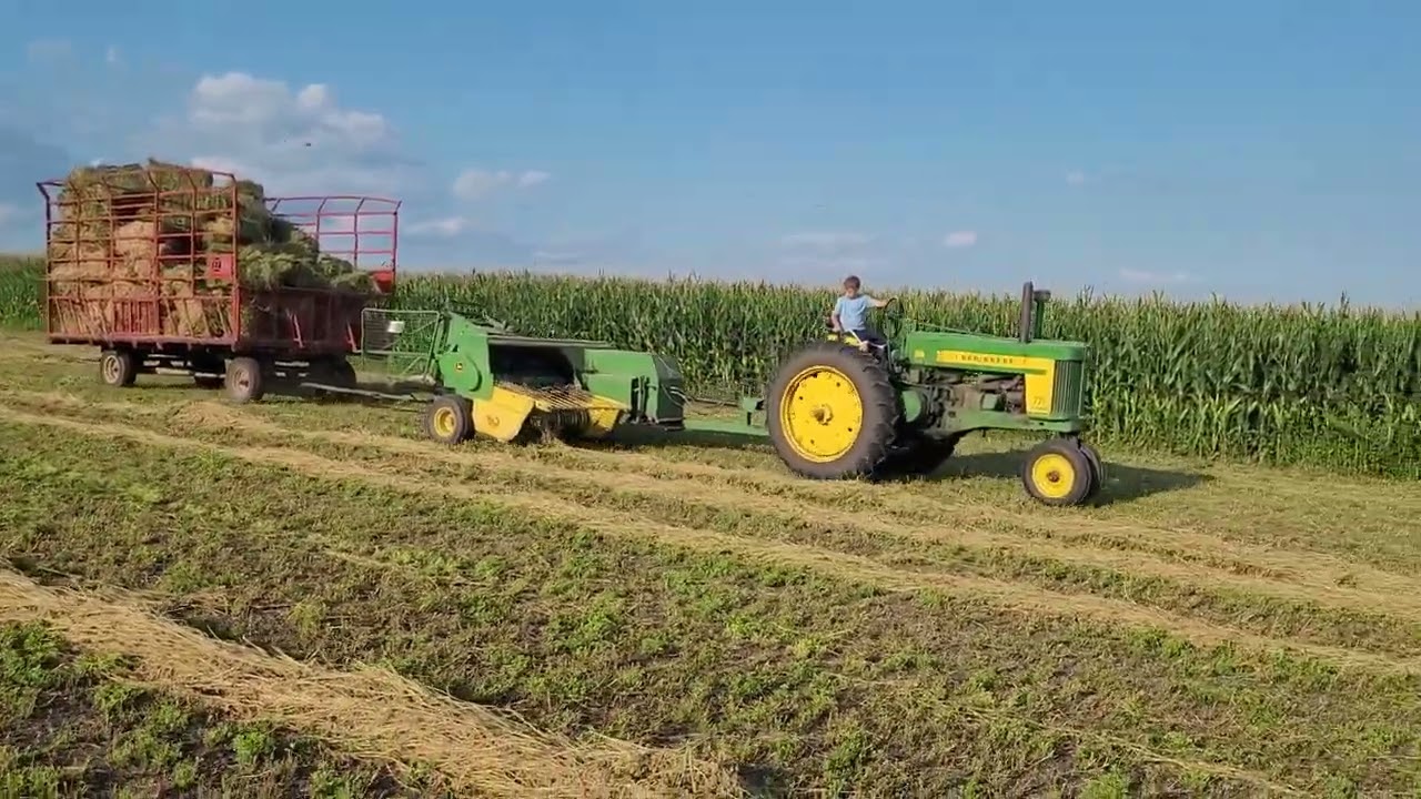 John Deere 720 Diesel an a 327 Baler.