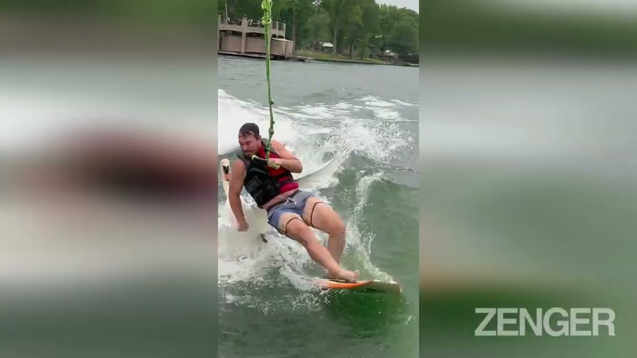 SWAN WAKE: Angry Swan Attacks Hapless Wake Surfer