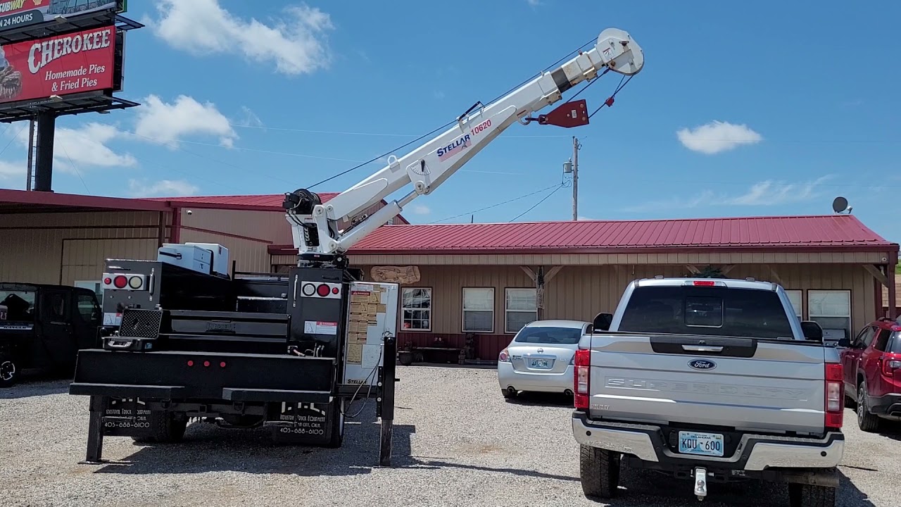 black dodge 5500 service truck with 10k crane and pto air compressor operating