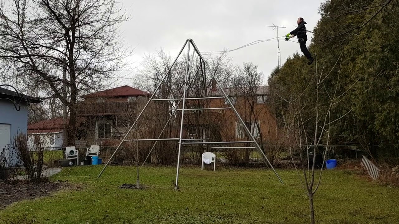 Jeremy on his 16 foot tall swing set, January 2 2019