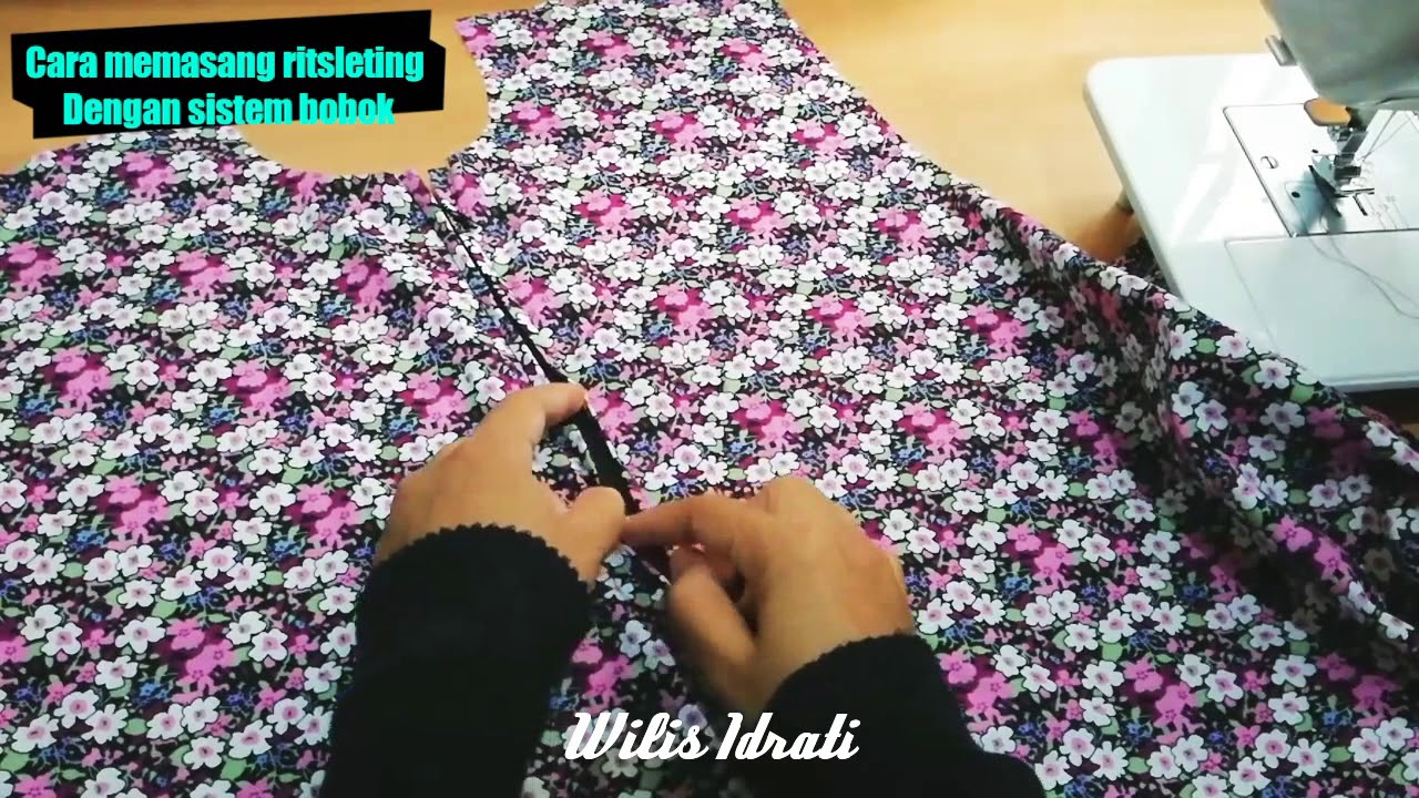 Cara memasang ritsleting dengan sistem bobok