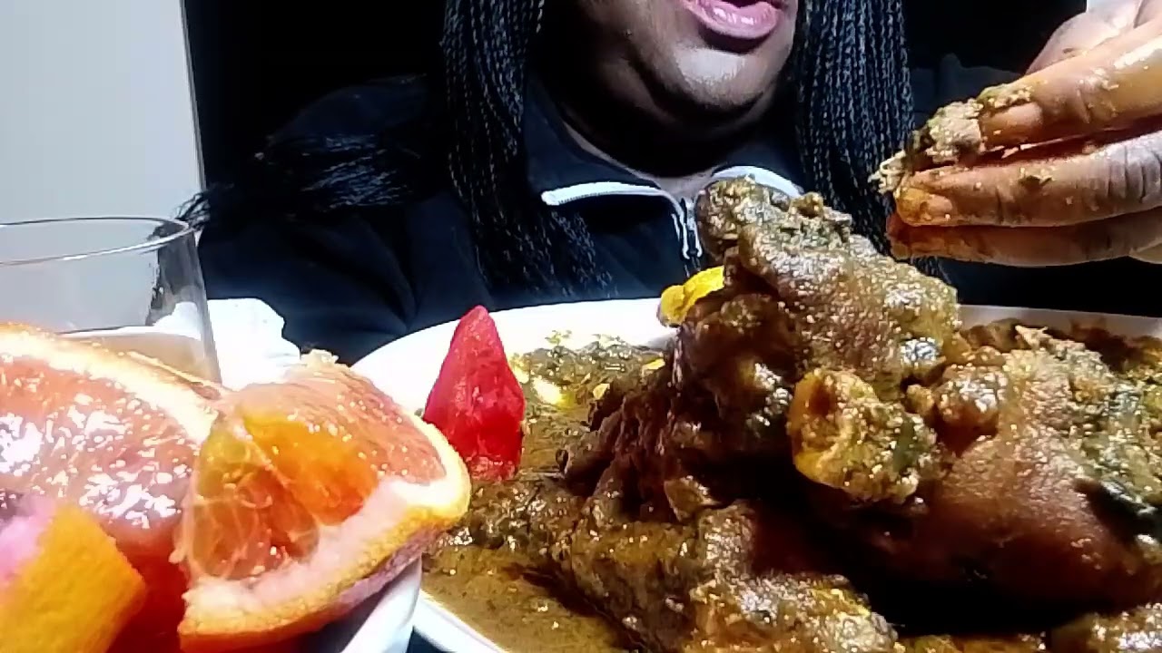 asmr Doris eating starch fufu with ( banga) palmnut soup fish goat meat delicious 