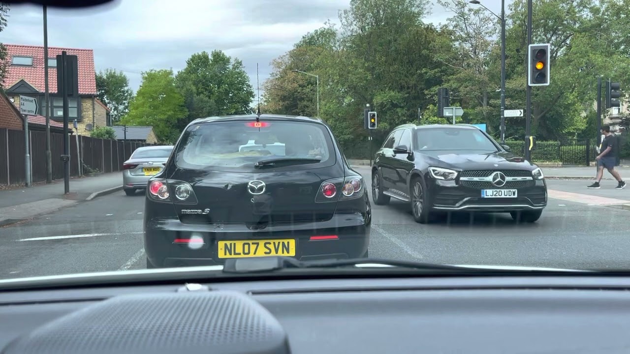 The Langley Road box junction WITH traffic ahead of the car