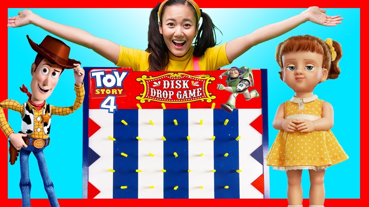 Ellie Plays Toy Story 4 GIANT DISC DROP GAME with Woody and Buzz | Toy Game Show