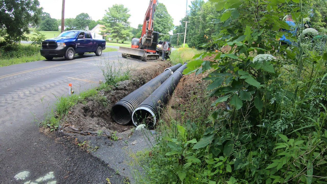 Installing double culvert pipes