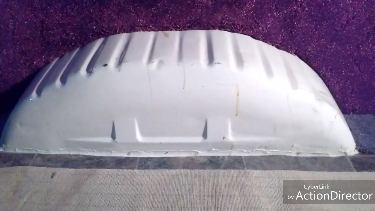 FORMING CARPET ON A WHEEL WELL