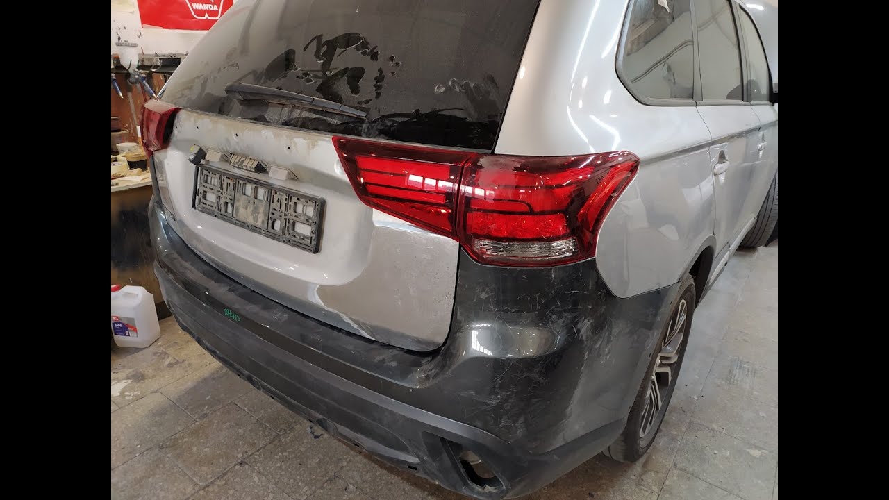 Mitsubishi Outlander сильный залом багажника.