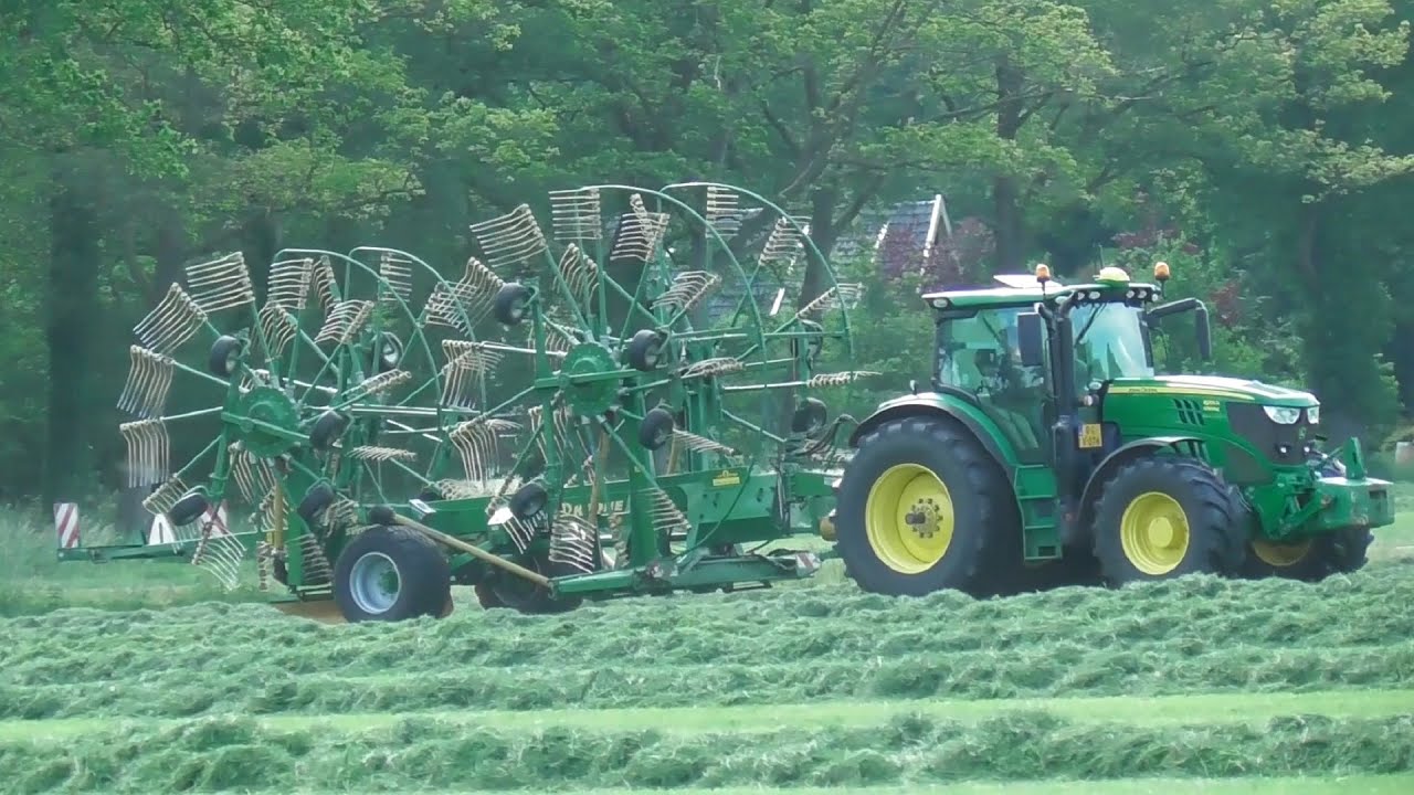 Raking silage with John Deere & Krone