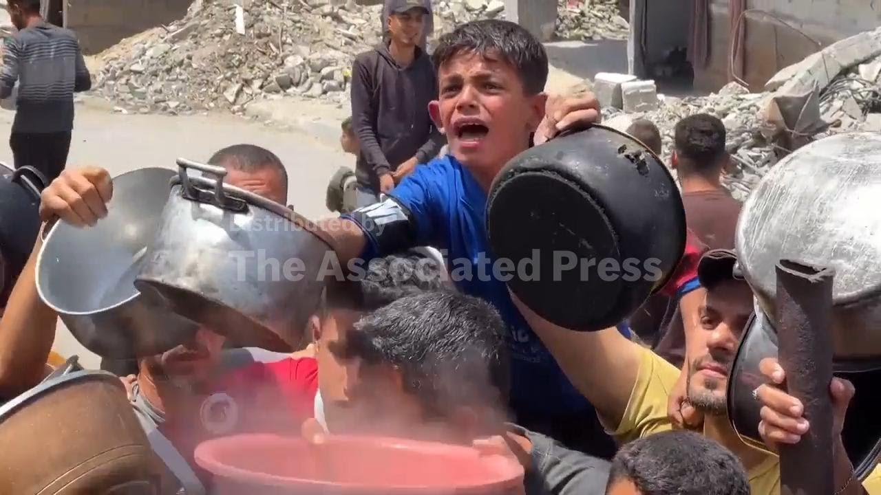Desperate families scramble for food in across embattled territory