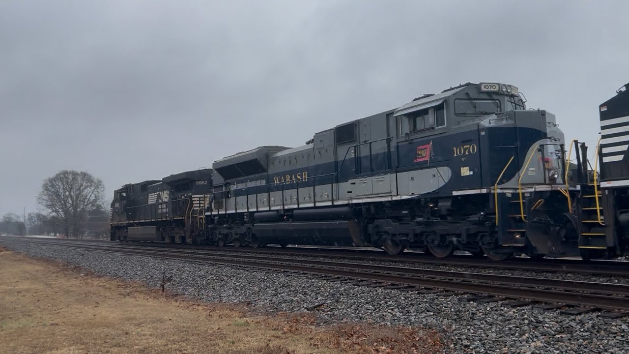 NS 1070 “Wabash” trails NS 24X in the rain with a friendly crew!